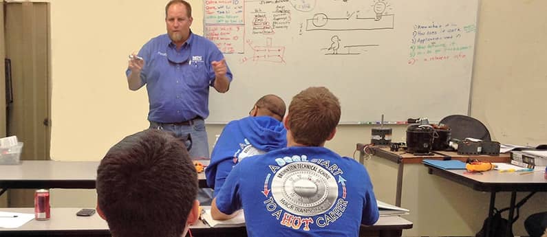 Brownson students in the classroom, an instructor at the front, teaching H V A C systems